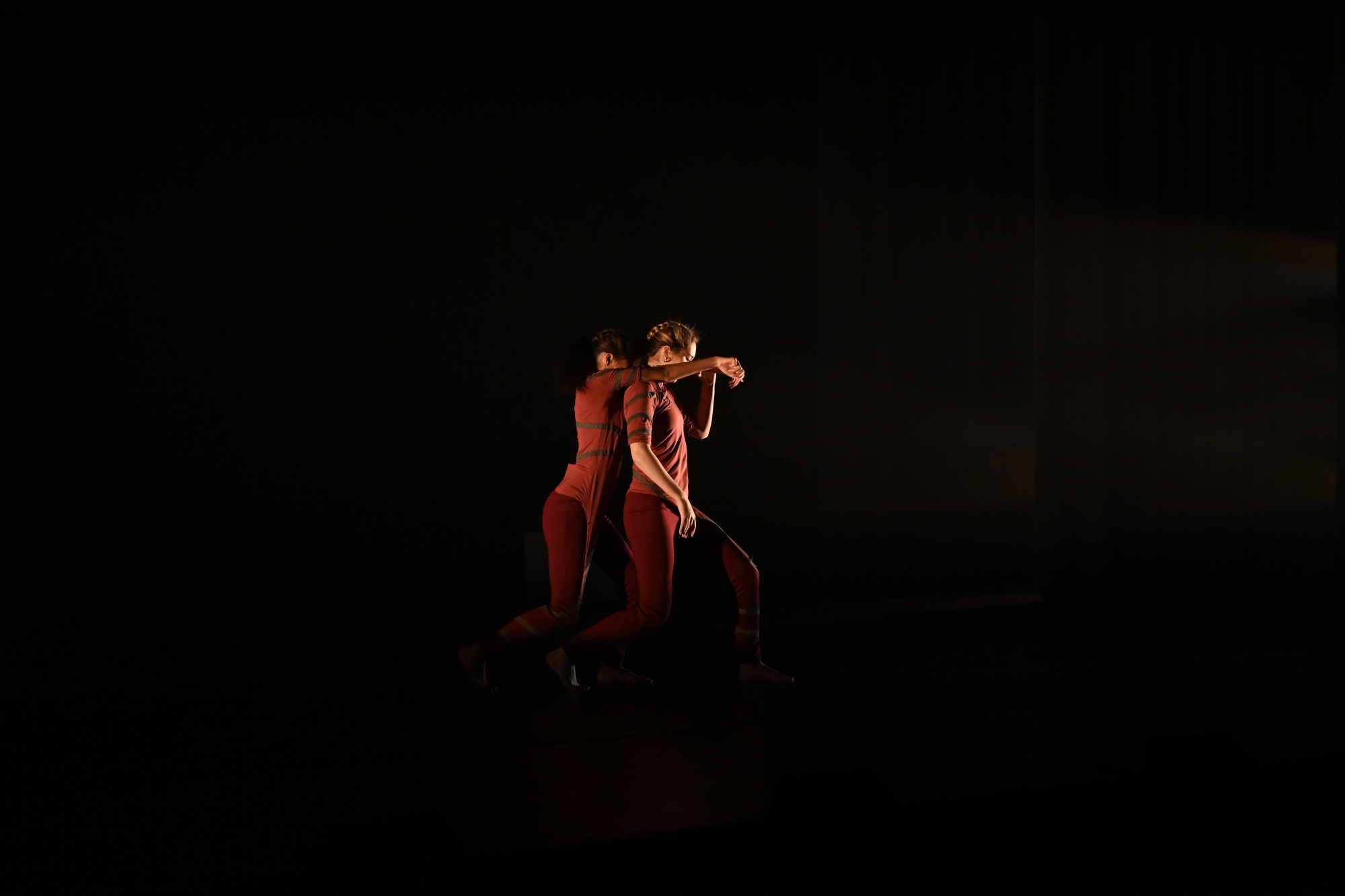 two dancers in red