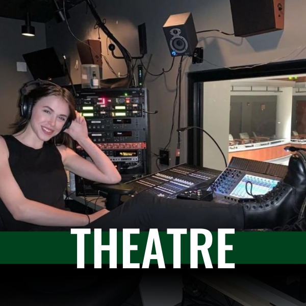 photo of a women running the sound booth for a theatre performance